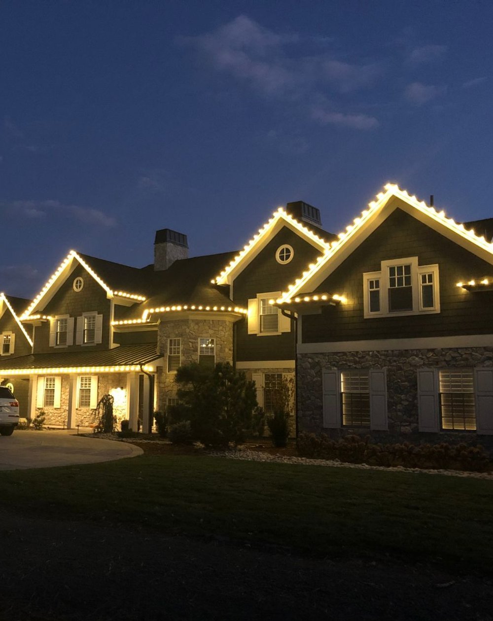 sunlight putting up holiday lighting in denver